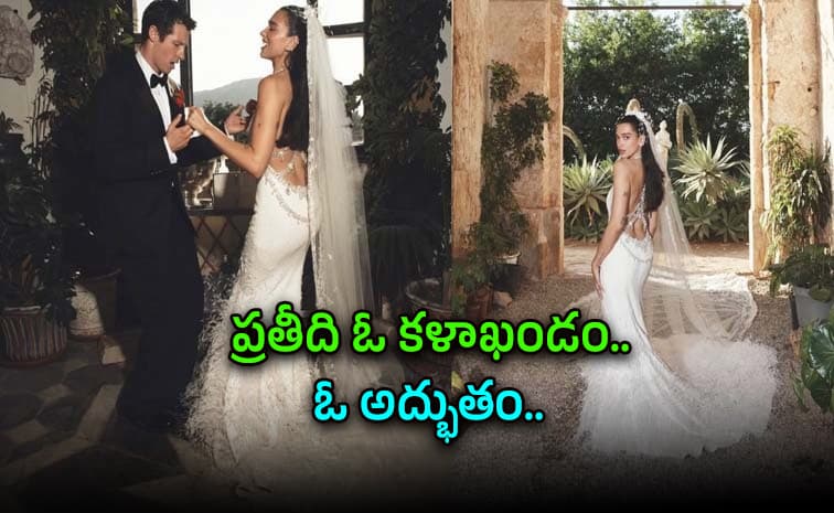 వేల ఈకలు, నాలుగు లక్షల పూసలు..ఏకంగా రూ. 1,155 గంటల ఎంబ్రాయిడరీ