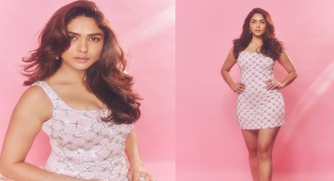 పింక్ మినీ డ్రెస్ లో మృణాల్ హోయ లు